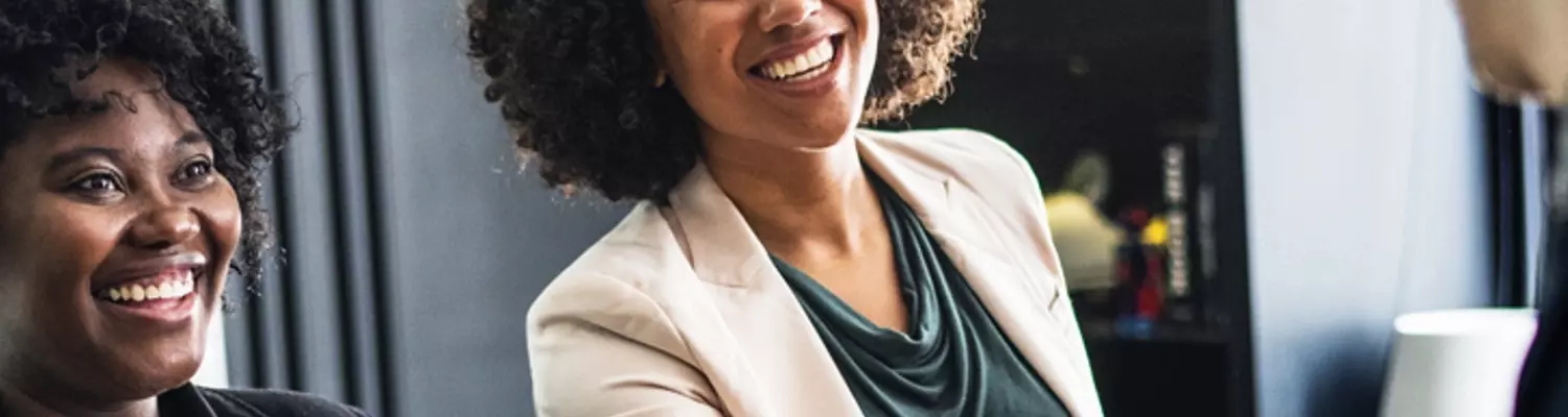 business woman shaking hands representing how to track affilliate sales